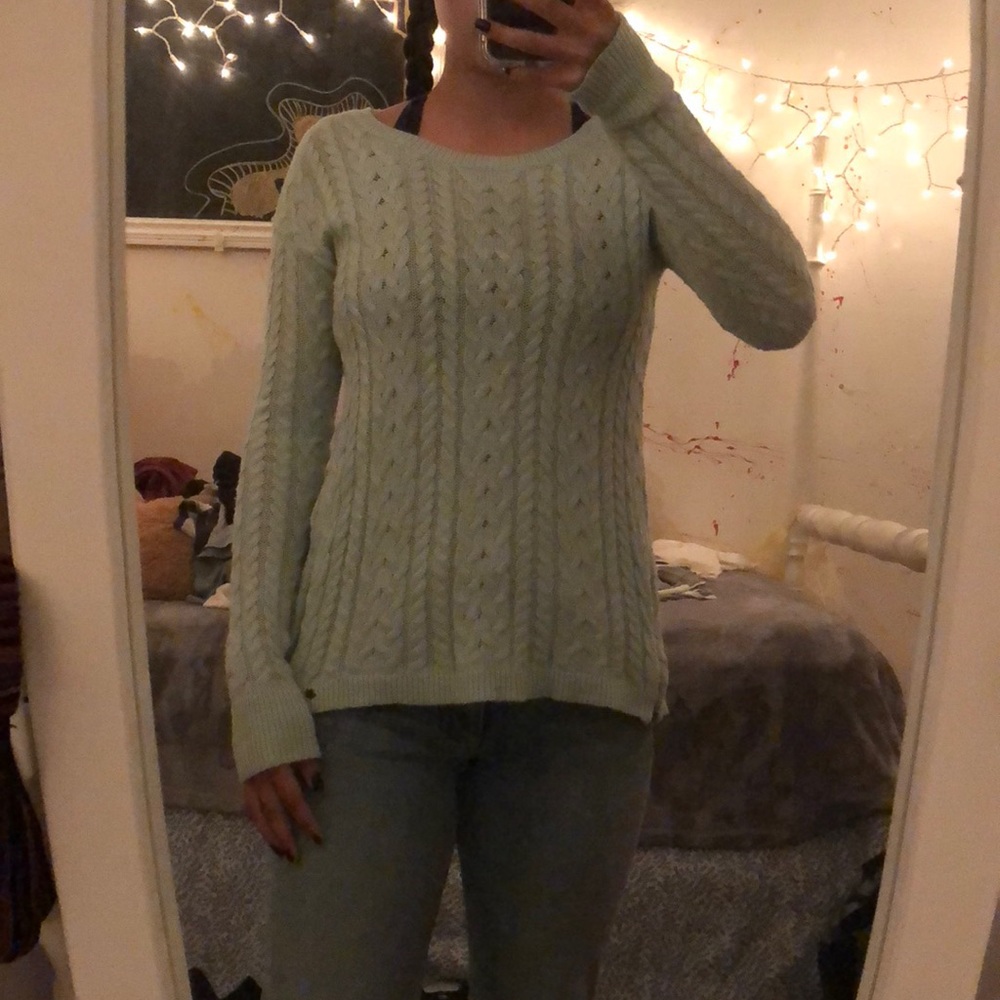 Knitted long sweater.